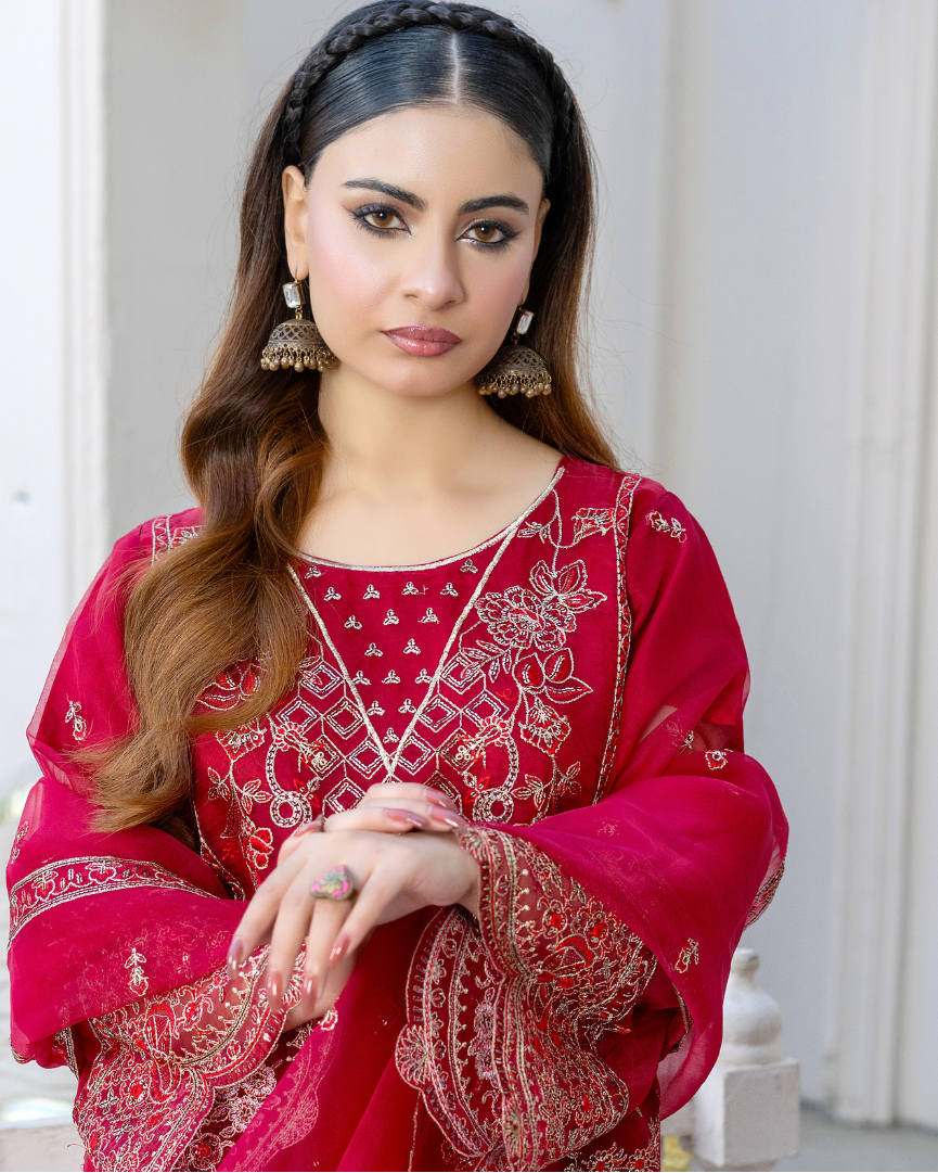 Neckline close up of Laal e Gul highlighting intricate embroidery pattern and artistry on organza fabric.