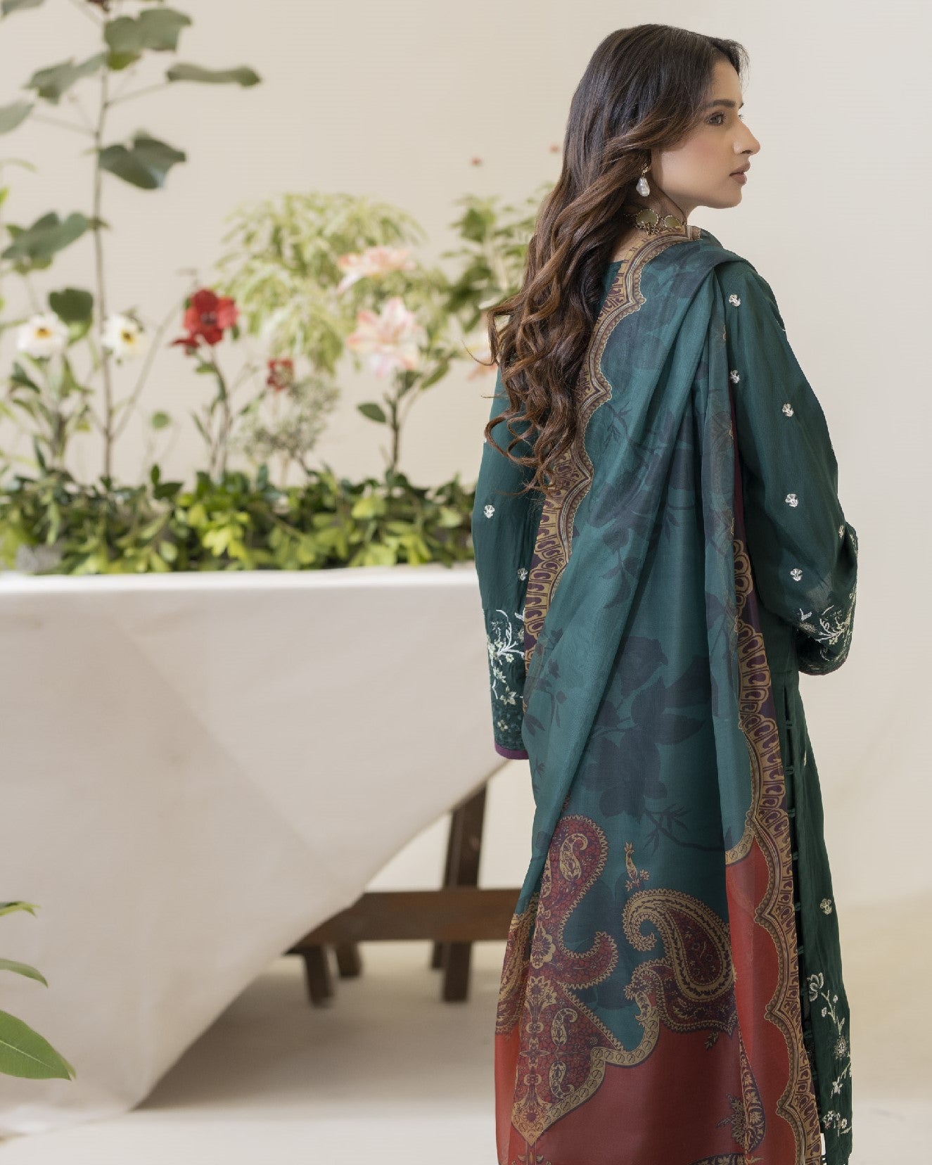 Back view of Amaya displaying embroidered back panel of the shirt with coordinated dupatta and trouser