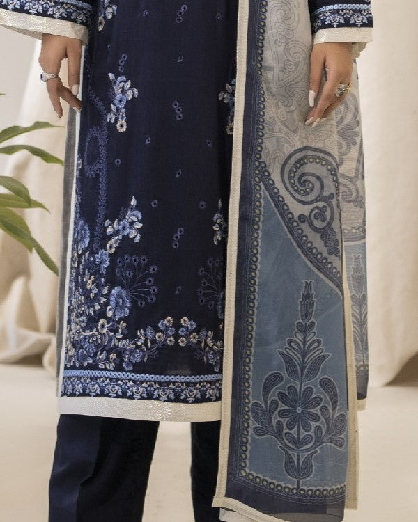 Detailed border view of Ayzel’s shirt hem embroidery revealing elegant motif work
