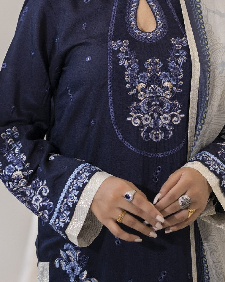 Neckline close up of Ayzel highlighting fine embroidery patterns on viscose fabric