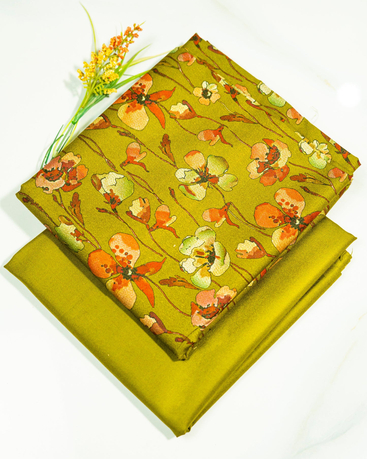 Yellow fabric with floral pattern on a white background