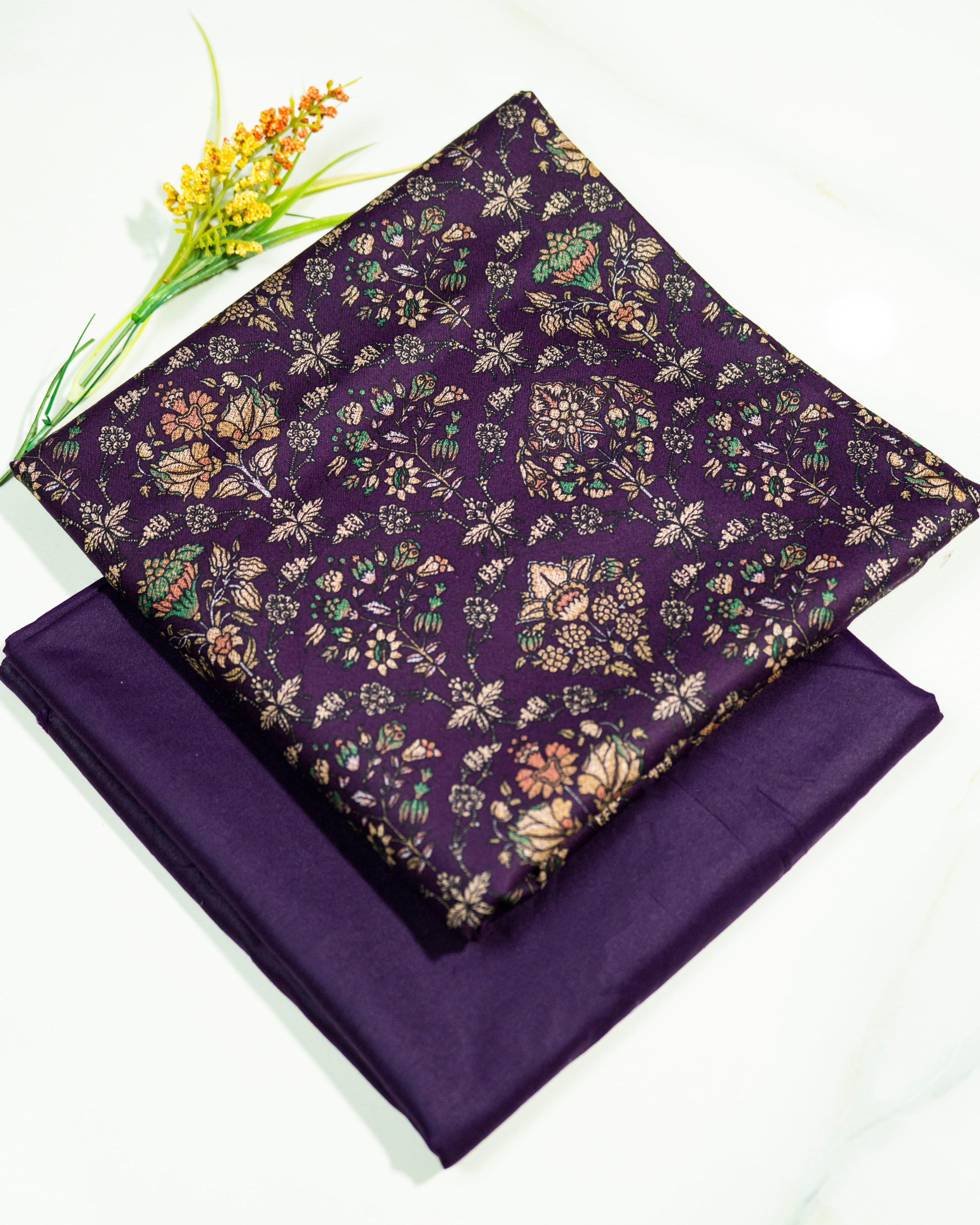 Purple fabric with floral pattern on a white background