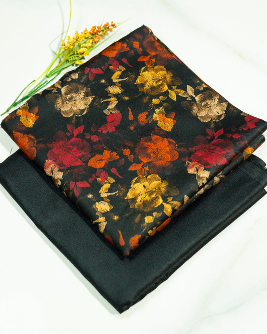 Black fabric with floral pattern on a white background