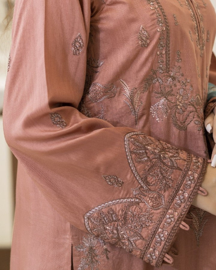 Close up of Lilli’s viscose shirt sleeve embroidery showing intricate threadwork and motif detailing