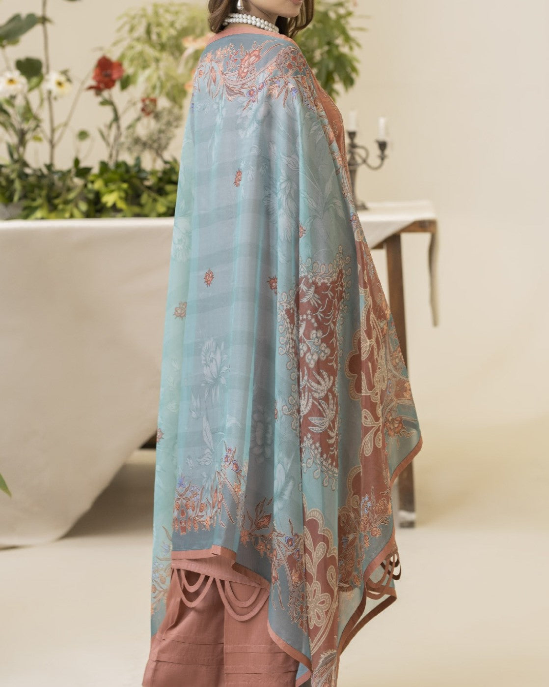 Back view of Lilli showing embroidered back panel of viscose shirt with coordinated trouser and dupatta