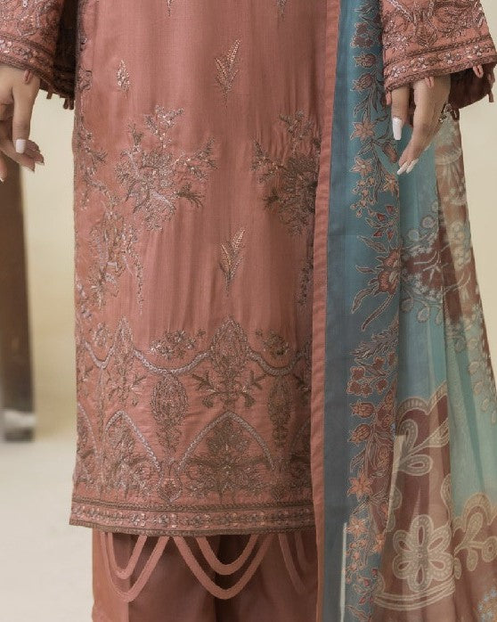 Detailed border view of Lilli’s shirt hem embroidery revealing elegant motifs and design work