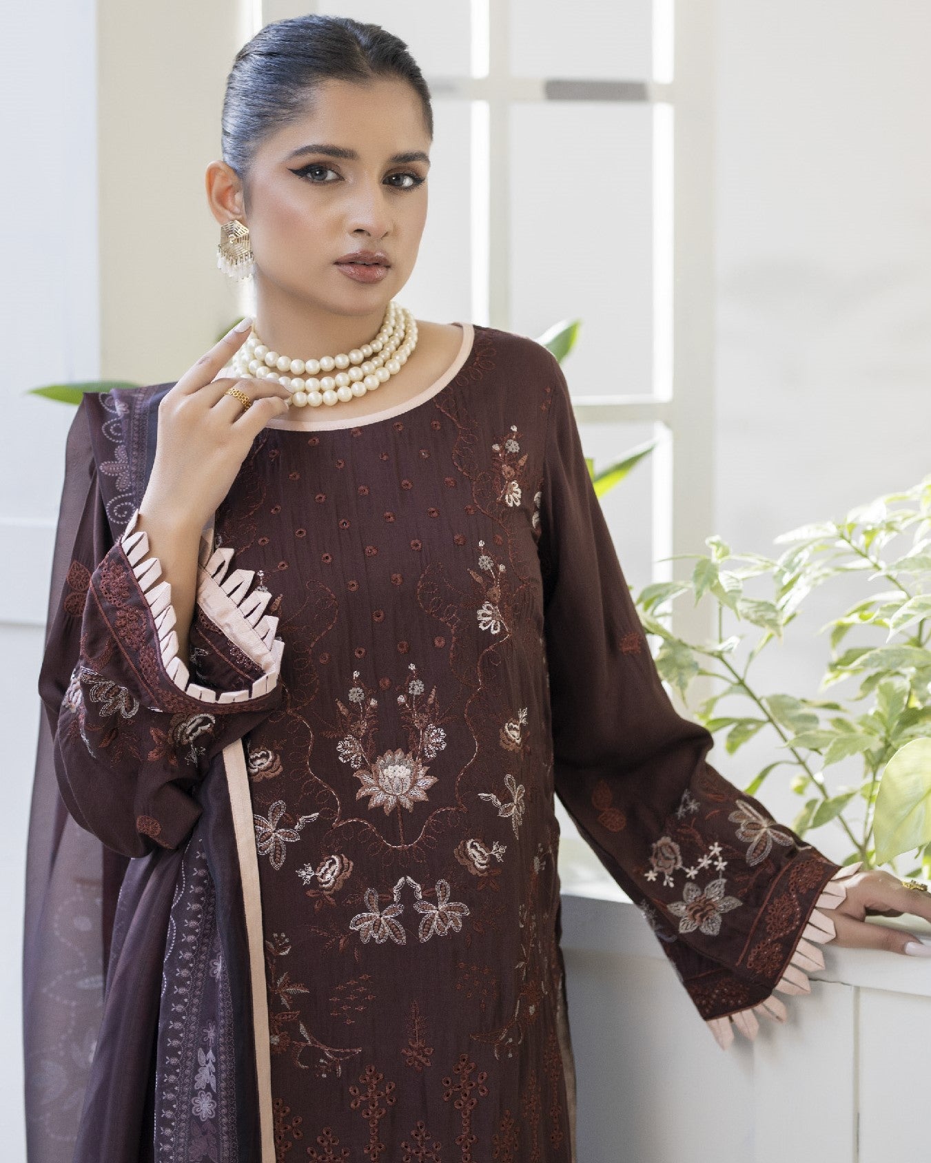 Neckline close up of Maha highlighting embroidery patterns and fine stitching on viscose fabric