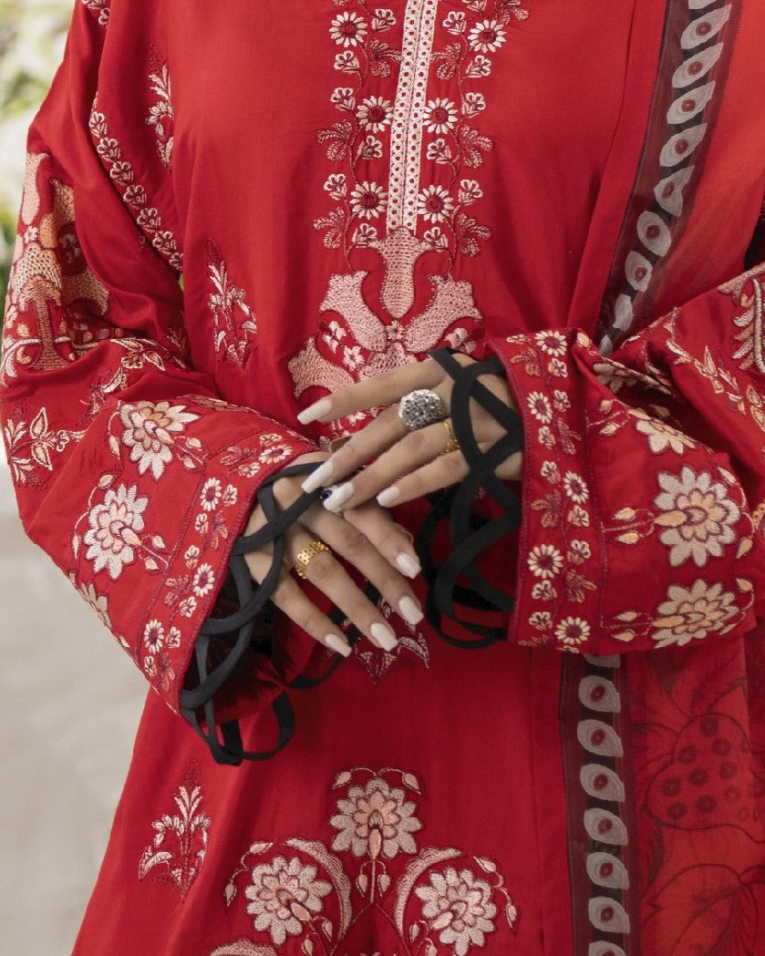 Close up of Miran’s viscose sleeve embroidery showing intricate motif work and border threading