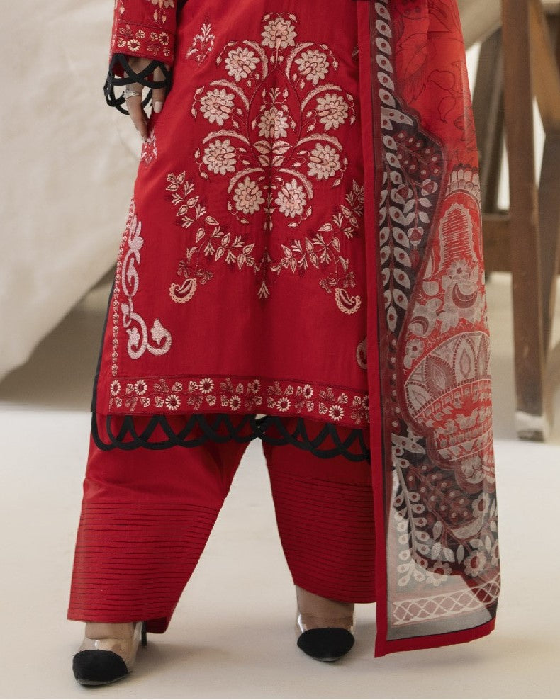 Detailed border view of Miran’s shirt hem revealing elegant embroidery and design flourishes